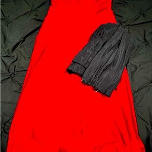 This is a beautiful 2 piece red gown with black neckline in size 36.